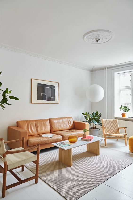 Brown sofa and white walls