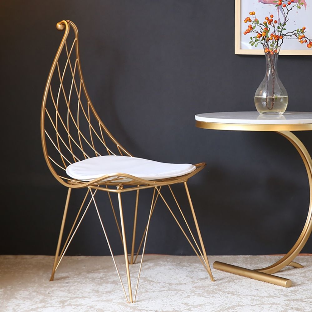 Modern Metal Dining Chair Hollow With PU Leather Cushion In Gold Finish   29b3604417e7429285755a19d2ca69be 