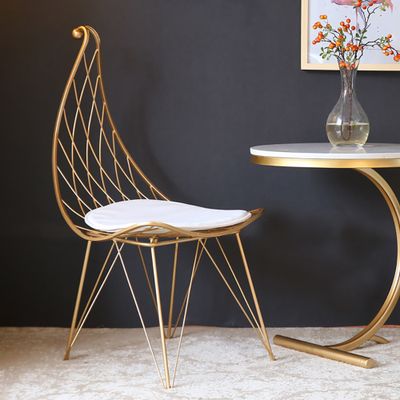 Glam Metal Dining Chair Hollow with PU Leather Cushion in Gold Finish Chair