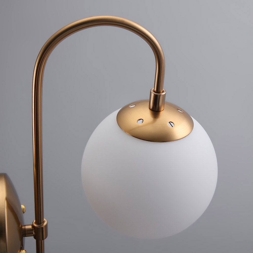 Minimalist Metal Curved Arm Aged Brass Single-Light Indoor Sconce with Round Backplate
