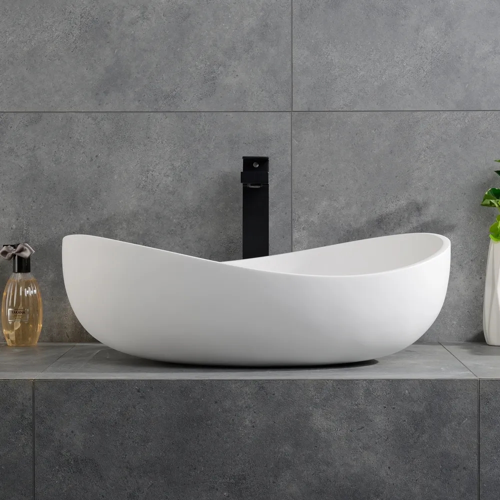 Lavabo ovale en pierre de salle de bain en résine moderne Blanc mat avec drain escamotable