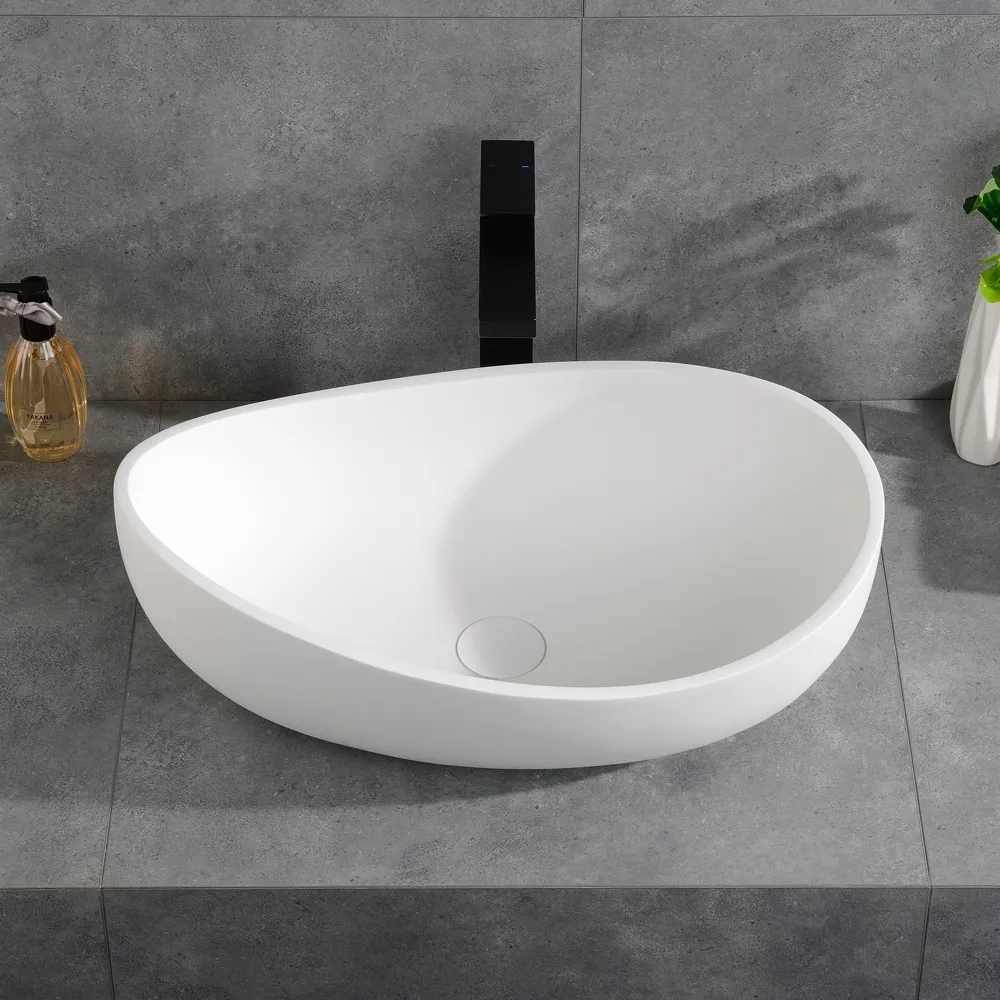 Lavabo ovale en pierre de salle de bain en résine moderne Blanc mat avec drain escamotable
