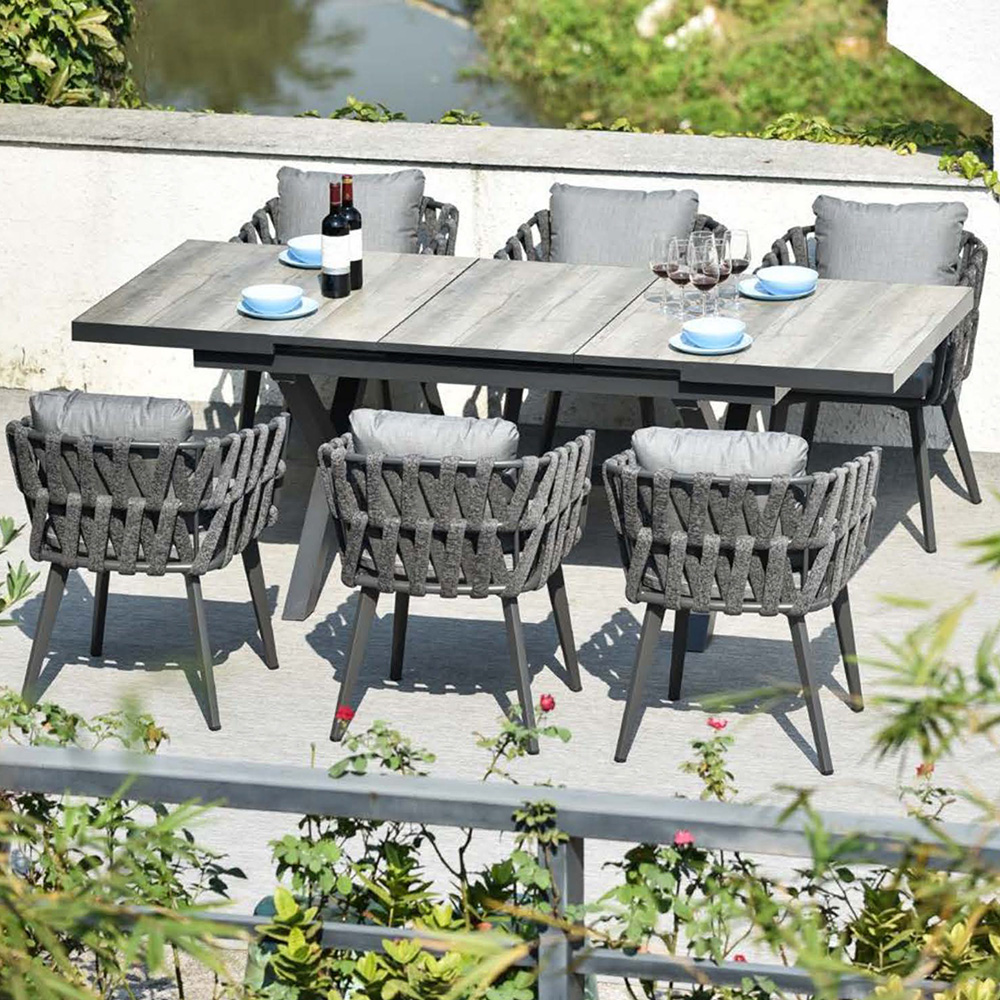 7 Pieces Aluminium Outdoor Dining Set with Extendable Ceramic Table and Woven Armchair