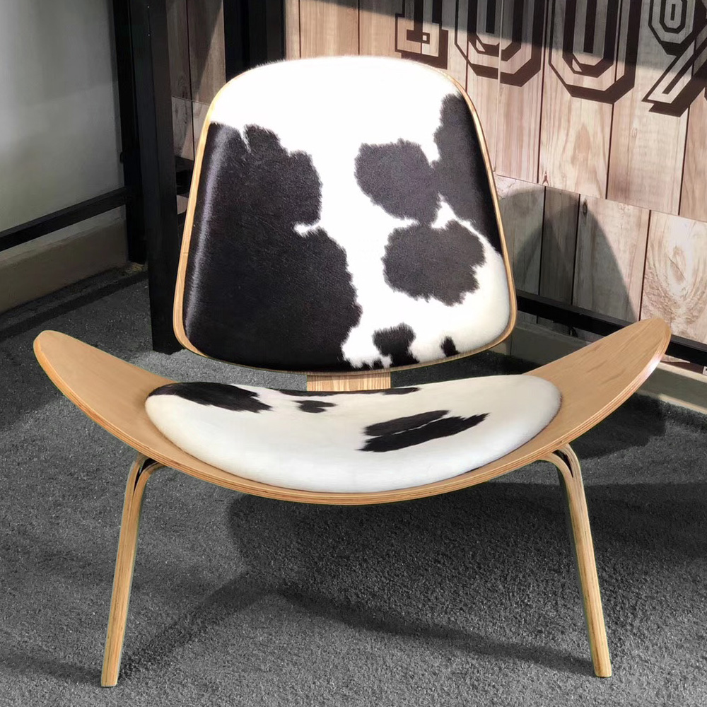 

Black & White Cowhide Lounge Chair with Manchurian Ash Wood Base