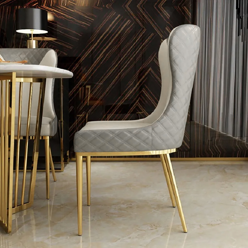 Lot de 2 chaises de salle à manger capitonnées en similicuir avec dossier ailé et pieds en acier inoxydable doré